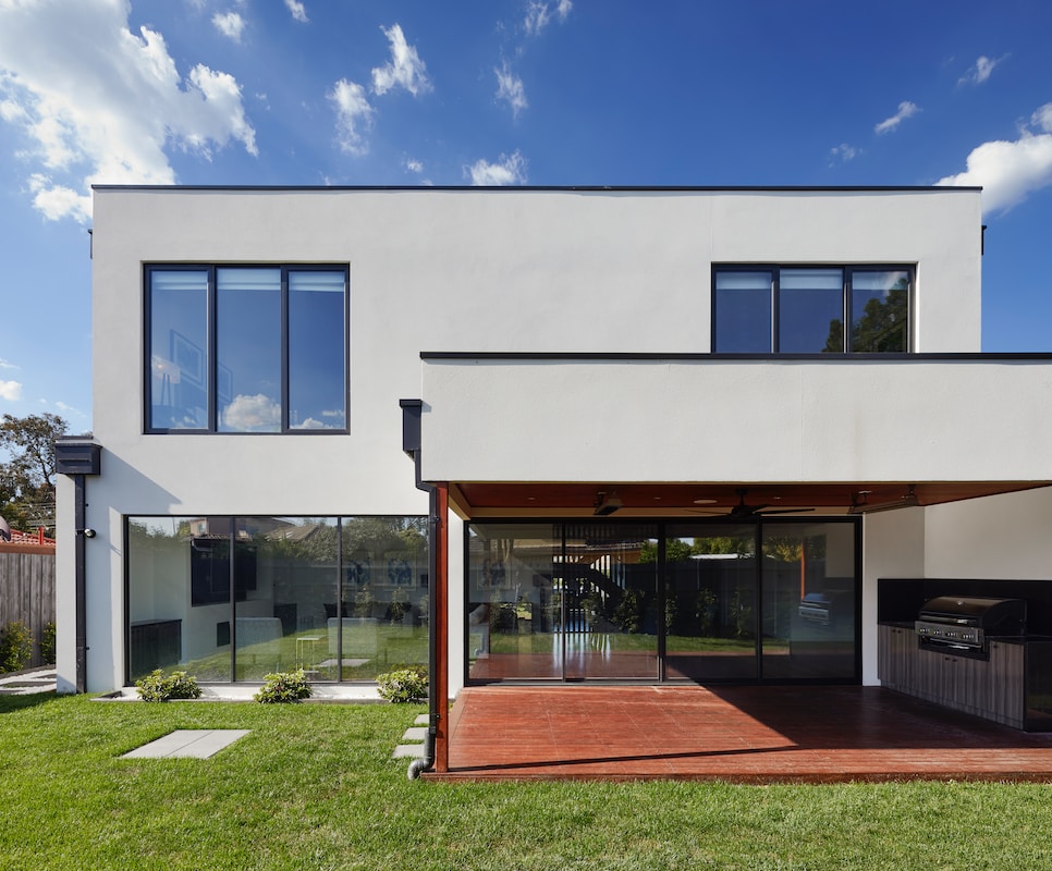 white concrete building under blue sky during daytime